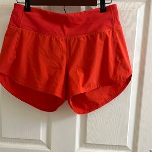 Lululemon Orange/Red 4” HR shorts
